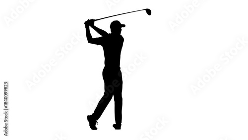 Silhouette of a Golfer Swinging a Club During a Game.