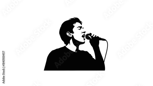 Silhouette of a man singing passionately into a microphone.
