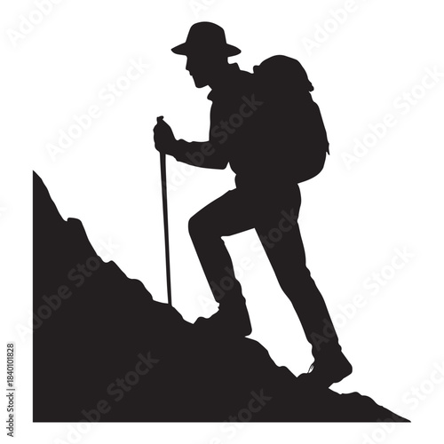 Silhouette of a hiker climbing a rugged mountain with trekking gear