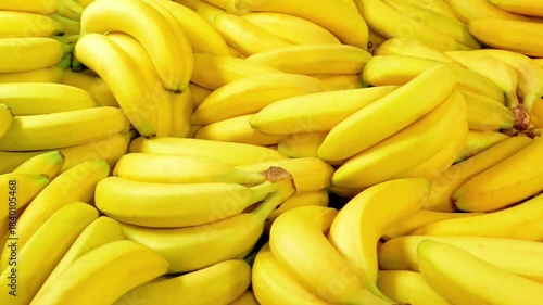 A pile of bright yellow bananas