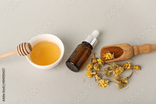 Bottle of essential oil, ho...