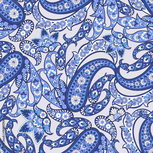 Paisley seamless vector pattern with fantastic flowers and leaves. Bohemian textile print inspired by batik. Vintage style