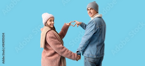 Happy couple in winter clot...