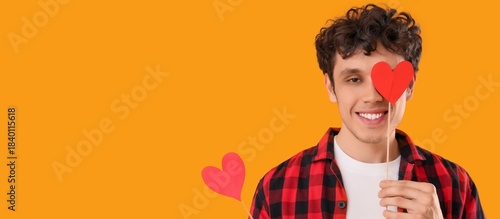 Happy man with paper hearts...