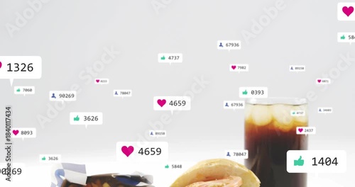 Single like bubble appearing badges floating grouping while burger fries cola rising showing likes