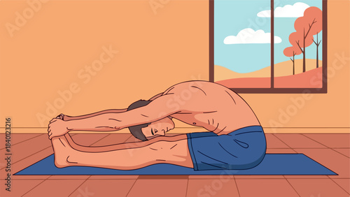 Man doing forward bend yoga pose in studio
