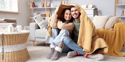 Loving couple with warm pla...