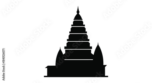 Elegant tiered temple structure with intricate details in a stark black silhouette