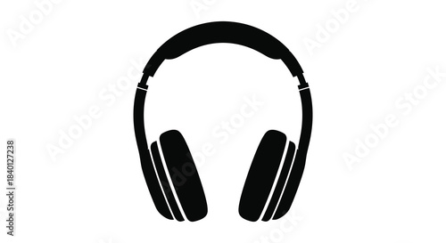 A striking black and white depiction of modern over ear headphones in a bold silhouette
