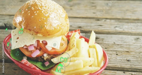 Camera pulling back on clip start, sesame burger centering, eco icons floating for sustainability