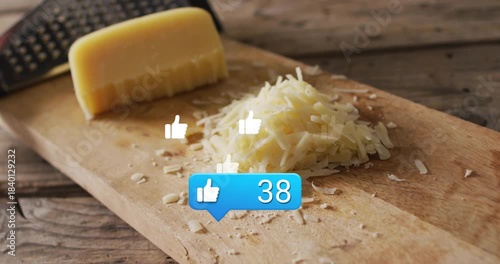 Blue like badge popping above grated cheese, counting likes and floating icons, showing engagement