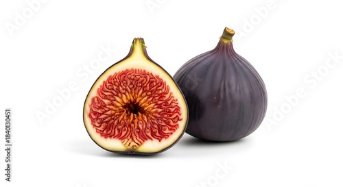 Fresh purple fig whole and half cut isolated on white background isolated on white background