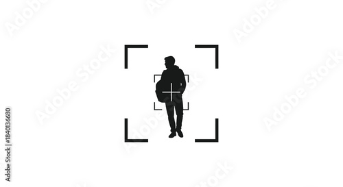 A person framed by a targeting reticle a stark visual representation in silhouette