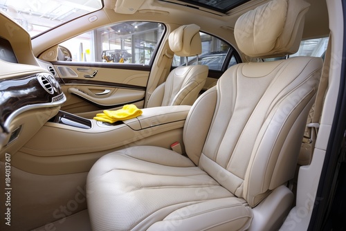 Yellow Microfiber Cloth On Car Center Console - Cleaning