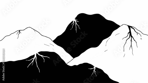 Dramatic contrast of black and white mountain peaks under a stark sky