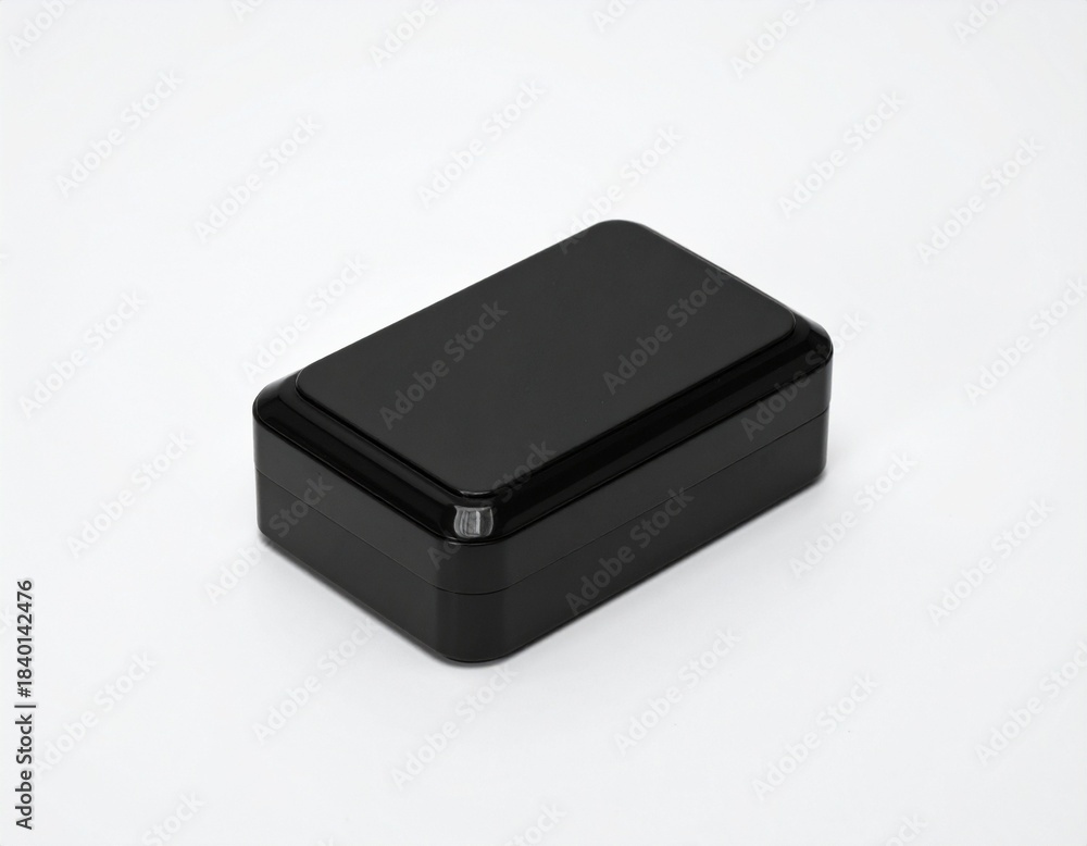 Fototapeta premium Compact Black Plastic Enclosure Box with Rounded Edges for Electronic Projects