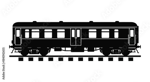 A striking black train car design resting on railway tracks presented as a silhouette