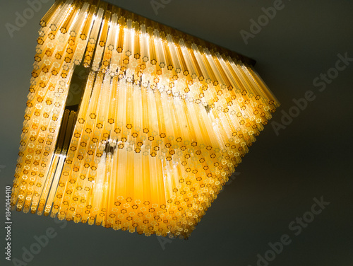 Hall featuring tall turquoise pillars, intricate carvings