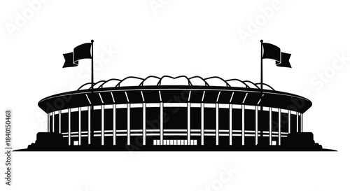 A striking black and white image of a stadium with waving flags a bold silhouette