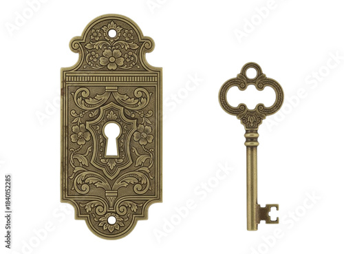 Ornate antique brass skeleton key and matching keyhole isolated