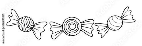 Assortment of wrapped candies with swirled and striped patterns, perfect for confectionary branding and sweet celebration themes.