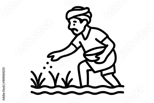 Agricultural worker planting seeds in the ground, depicting traditional farming methods