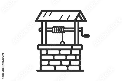 Classic water well structure featuring a winding mechanism and brickwork base