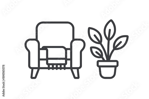 Cozy armchair with a blanket and potted houseplant for home interior design