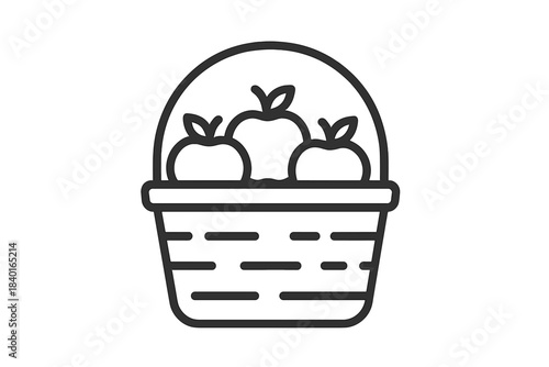 Harvest season concept featuring a wicker basket overflowing with fresh ripe apples