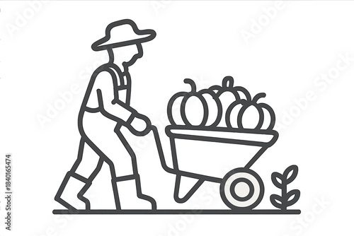 Agricultural worker pushing a wheelbarrow loaded with pumpkins during the autumn harvest