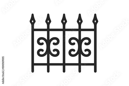 Ornate wrought iron fence section with decorative scrollwork and pointed finials