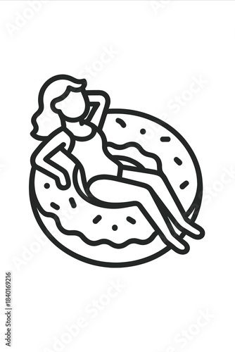 Young woman relaxing on a giant inflatable donut float ring during summer vacation leisure time