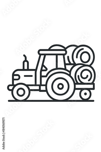 Agricultural tractor vehicle transporting round hay bales on a trailer