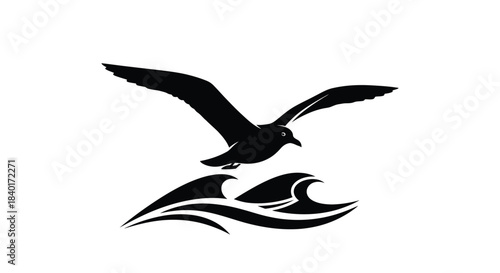 Silhouette of an eagle in flight with wings spread and talons extended