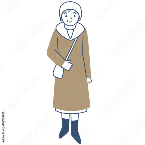 冬のコートを着たシニア女性