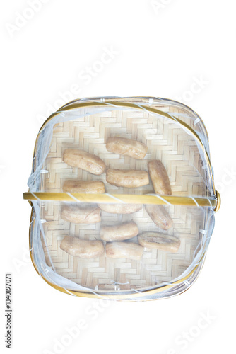 Top view of Dried bananas in Bamboo basket to prevent cattle fly, focus selective