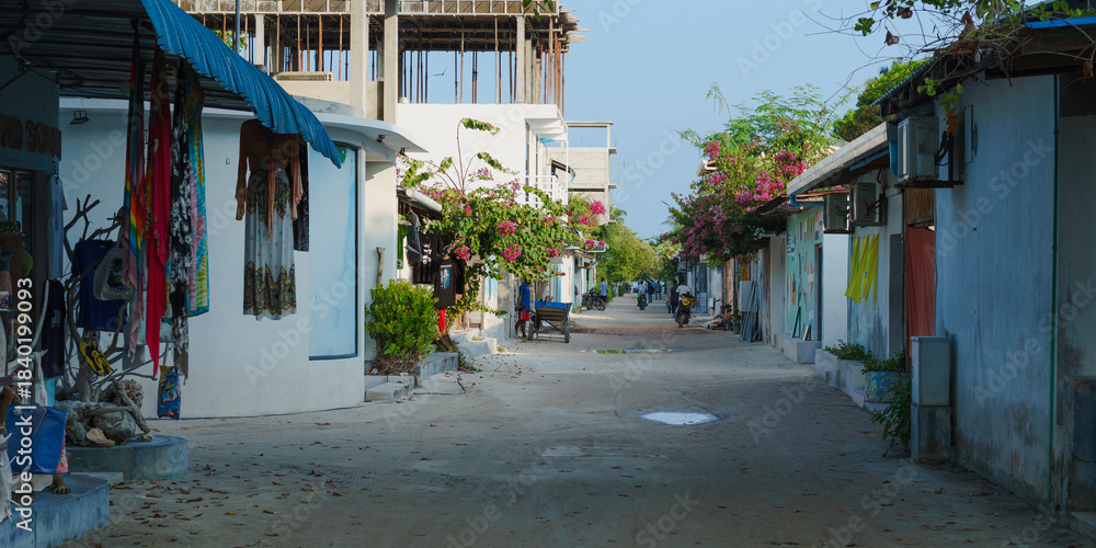 Obraz premium Maldivian Street in small local island. Rasdhoo, Maldives. 