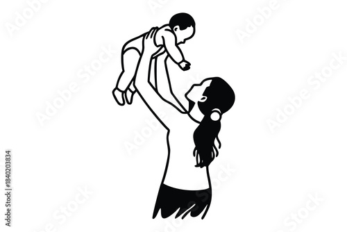 Loving mother lifting baby up in black silhouette