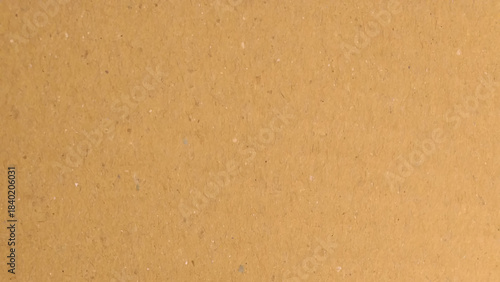 The brown tone is warm and natural, reflecting a simple and eco-friendly material. a brown cardboard surface with a characteristic texture.
