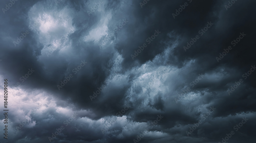Fototapeta premium Dark clouds dominating the sky, create a dramatic scene