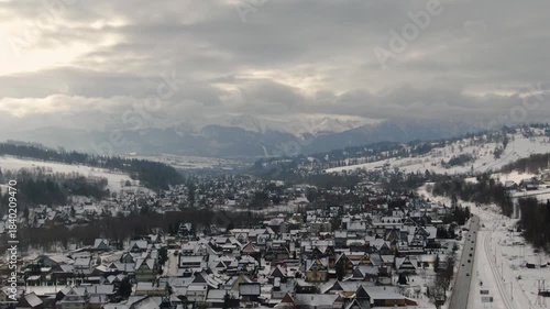 Aerial View of Poronin and the Zakopianka Road Leading to Snowy Tatra Mountains.