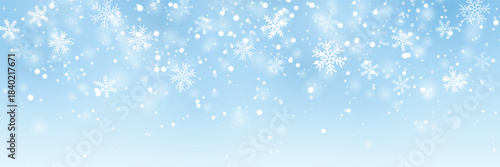 Winter background with falling snowflakes and snowfall on a soft blue sky, vector illustration.