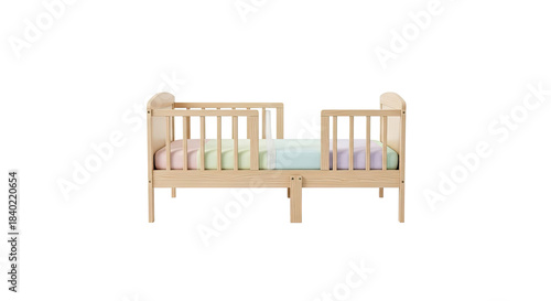 A wooden toddler bed with a colorful quilt and a white background.