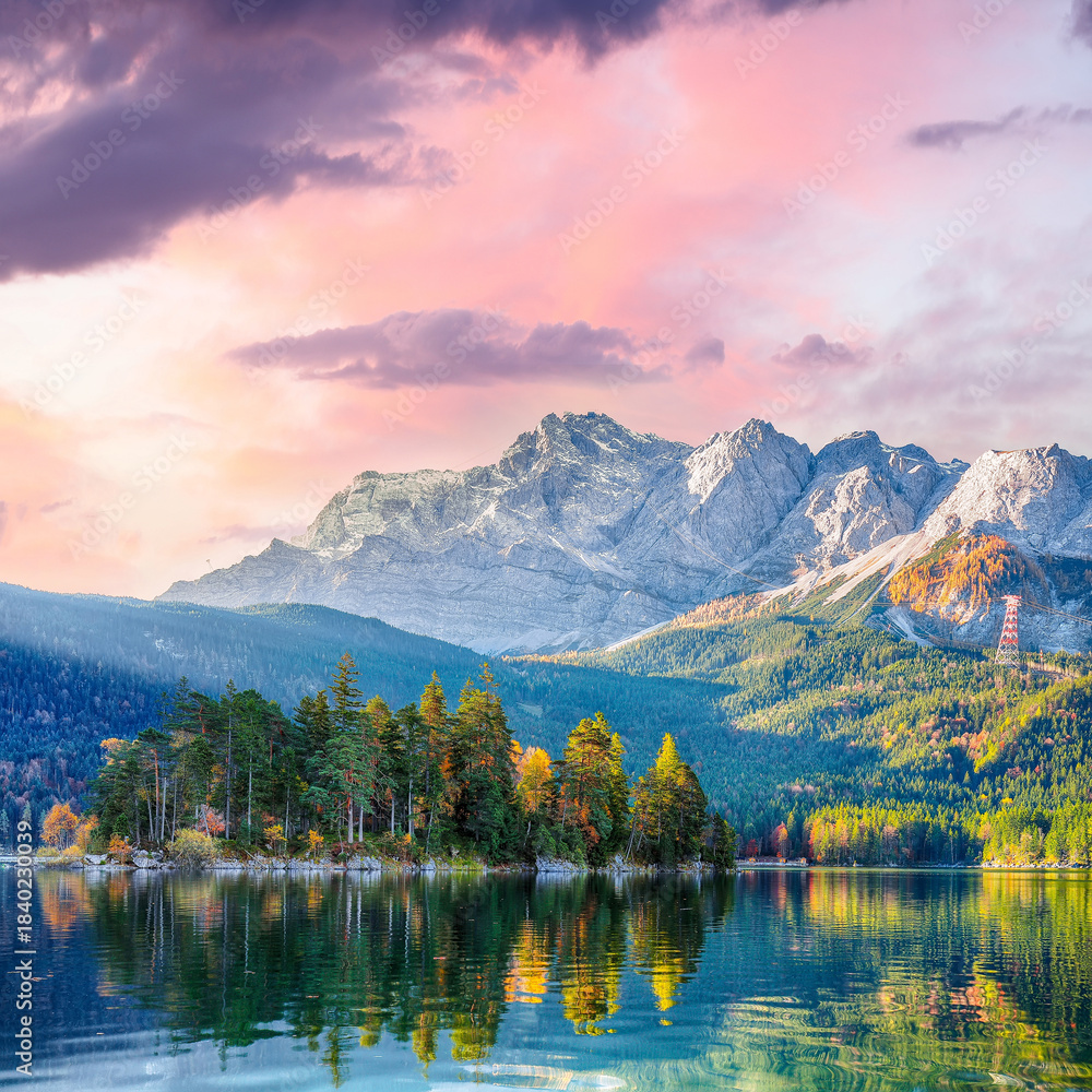 Fototapeta premium Stunning autumn landscape of Eibsee Lake in front of Zugspitze summit under sunset