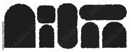 A set of black edge frames with jagged edges in rounded and arched shapes. Grunge-style elements.Curved vector silhouettes for collages, stickers, banners, labels, and text boxes