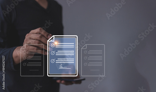 Young man with smartphone mobile hand using a pen touching to sign a Online Business Contract, Electronic signature, Contract signing, Digital documents, Future smart contract