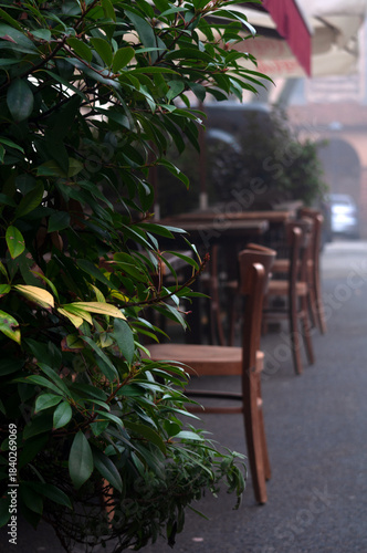 outdoor tables in a restaurant in Piacenza, Italy