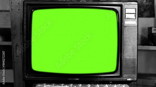 CRT Television With Green Screen in Monochrome Room, Zoom In - Authentic Footage, Not AI-Generated - 4K