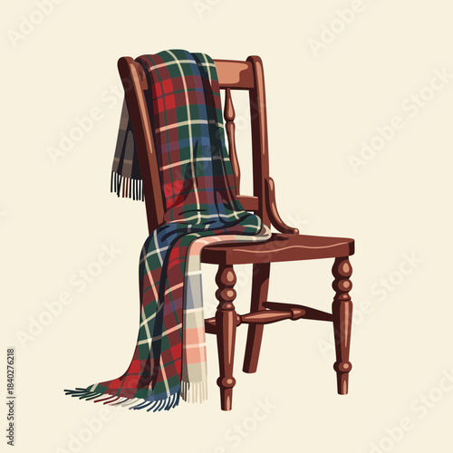 Rustic wooden chair draped with a colorful tartan plaid blanket for cozy decor