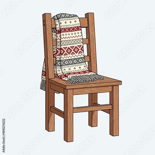 Rustic wooden chair with cozy knitted throw blanket draped over backrest for home decor